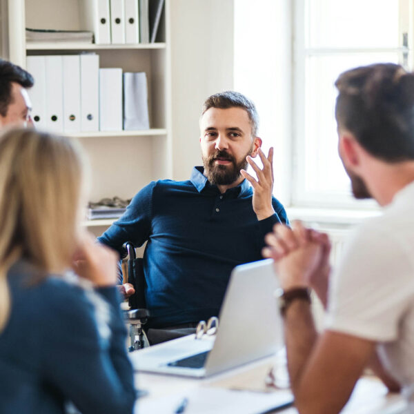 Coworkers collaborating together in an office.